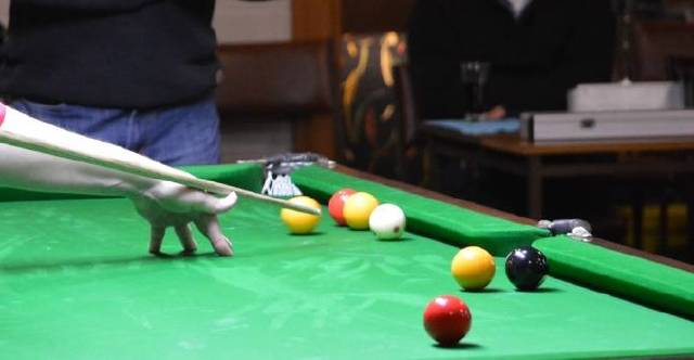 Tight fight in 8-ball derby