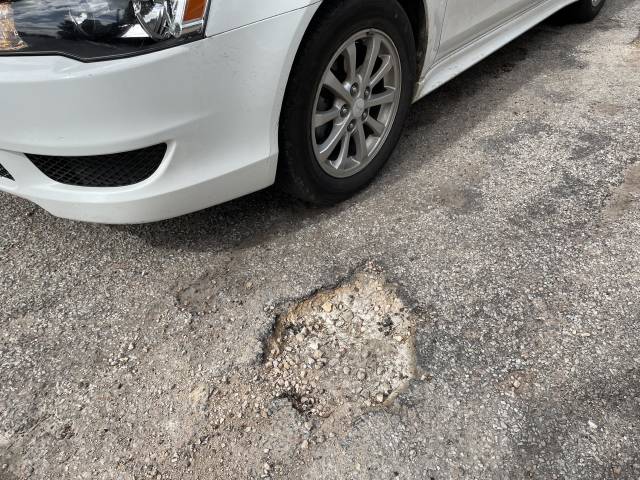 Potholes on Racecourse Road particularly bad due to heavy rainfall