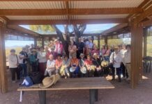 Volunteers tour arid garden